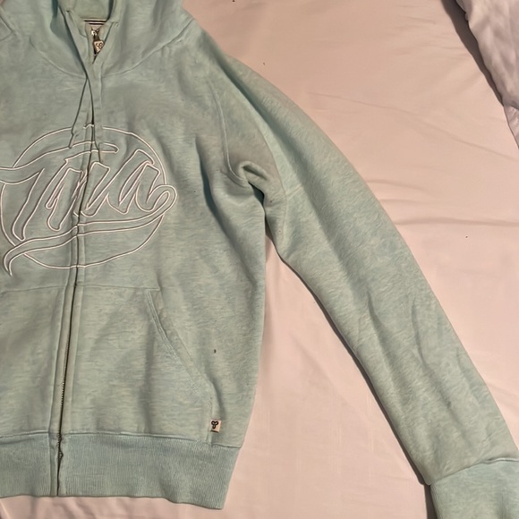 This sweater is a beautiful kind of light teal colour! - Picture 2 of 4